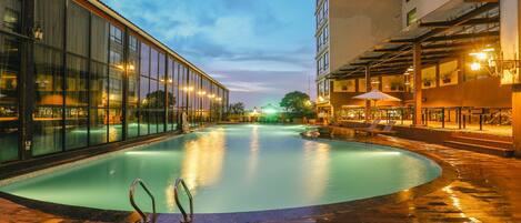 Outdoor pool, pool umbrellas, sun loungers