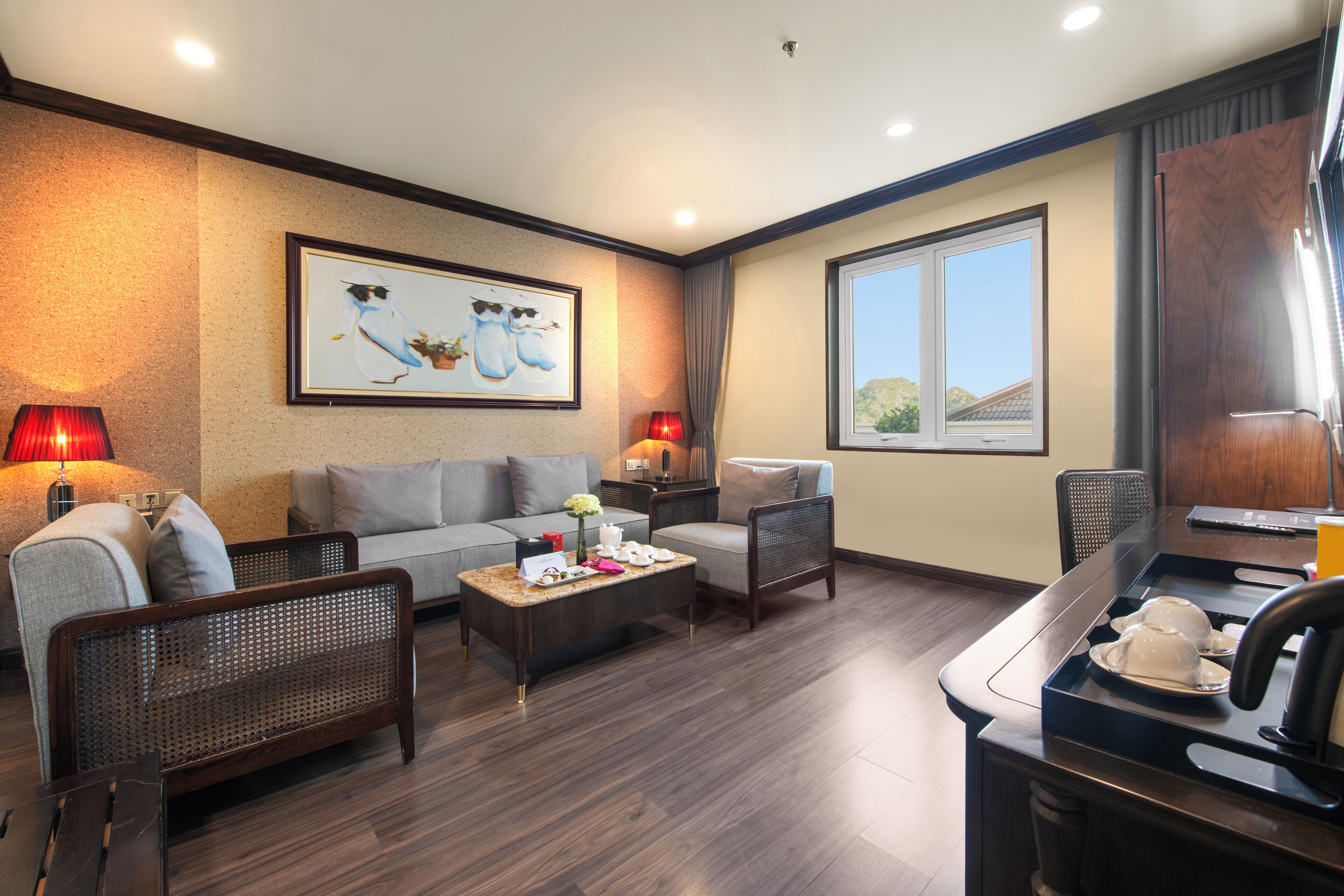 A modern living room with a sofa, chairs, a coffee table, and a dining area with a table and chairs.