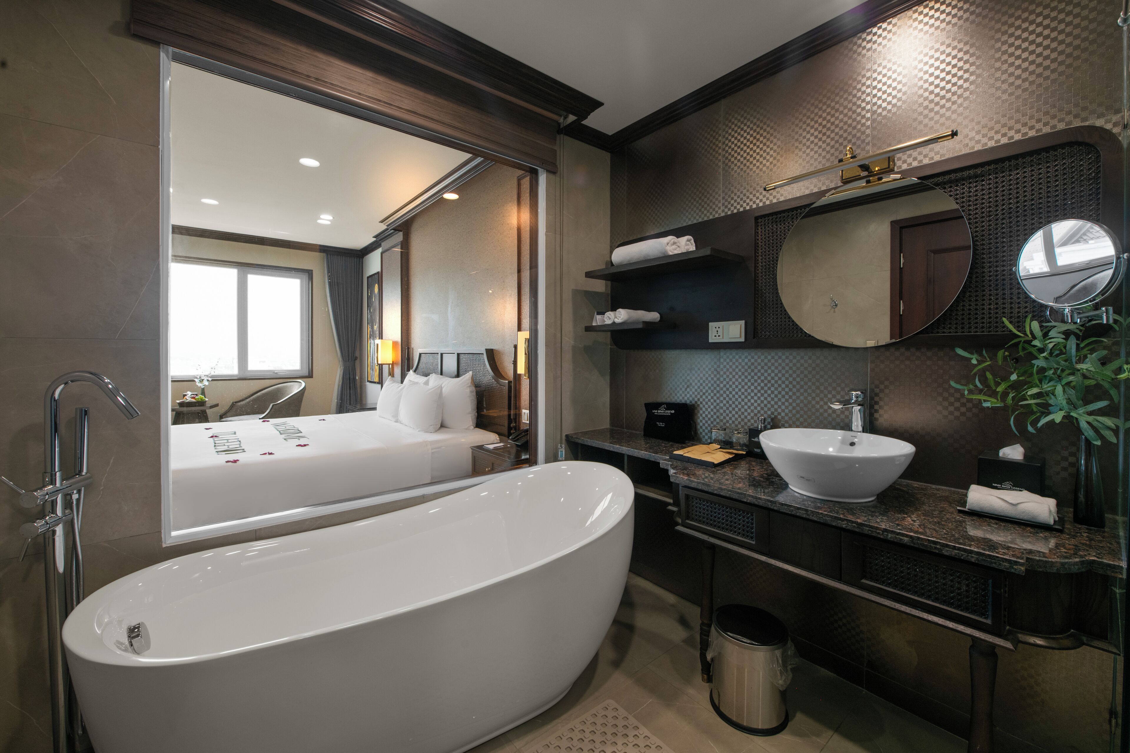 grand suite double connecting room (indochine wing) | bathroom | separate bathtub and shower, deep-soaking bathtub, rainfall showerhead