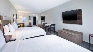 Suite, Multiple Beds | Premium bedding, desk, blackout drapes, iron/ironing board