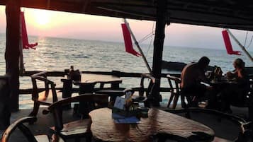 Breakfast, lunch, dinner served; beach views