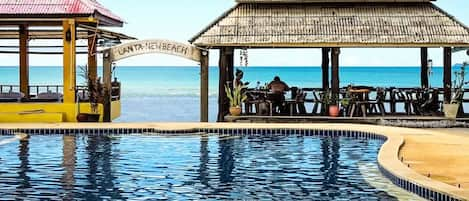 Breakfast, lunch, dinner served; beach views 