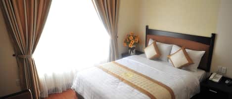 Deluxe dubbelrum | Minibar, värdeförvaringsskåp på rummet, gratis wi-fi och sängkläder