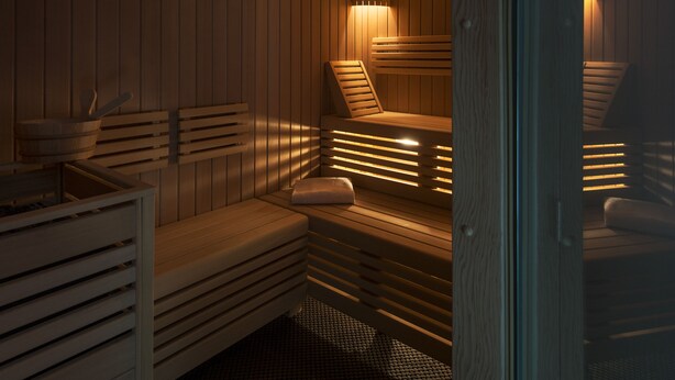A sauna room with wooden benches and a tiled floor. - Seven Urban Suites Nantes Centre (Nantes)