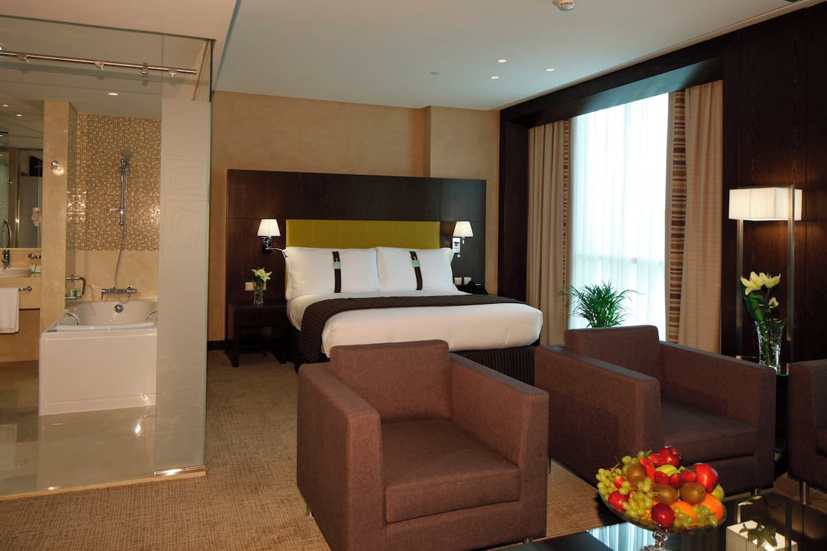 Suite, 1 King Bed | Minibar, in-room safe, desk, laptop workspace
