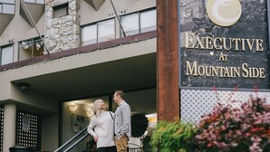 A building with a sign reading "Executive at Mountain Side." - Mountain Side Hotel Whistler by Executive (Whistler)