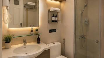 Shower, free toiletries, hair dryer, slippers