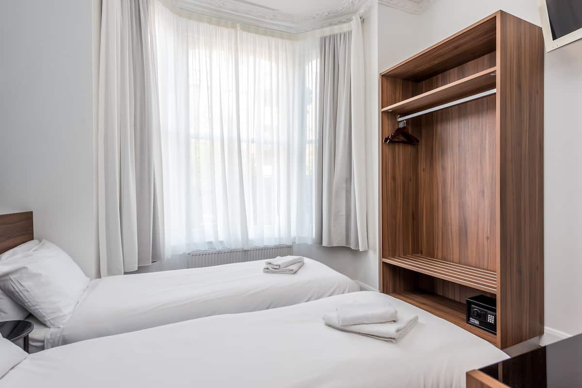 Premium bedding, desk, iron/ironing board (on request)