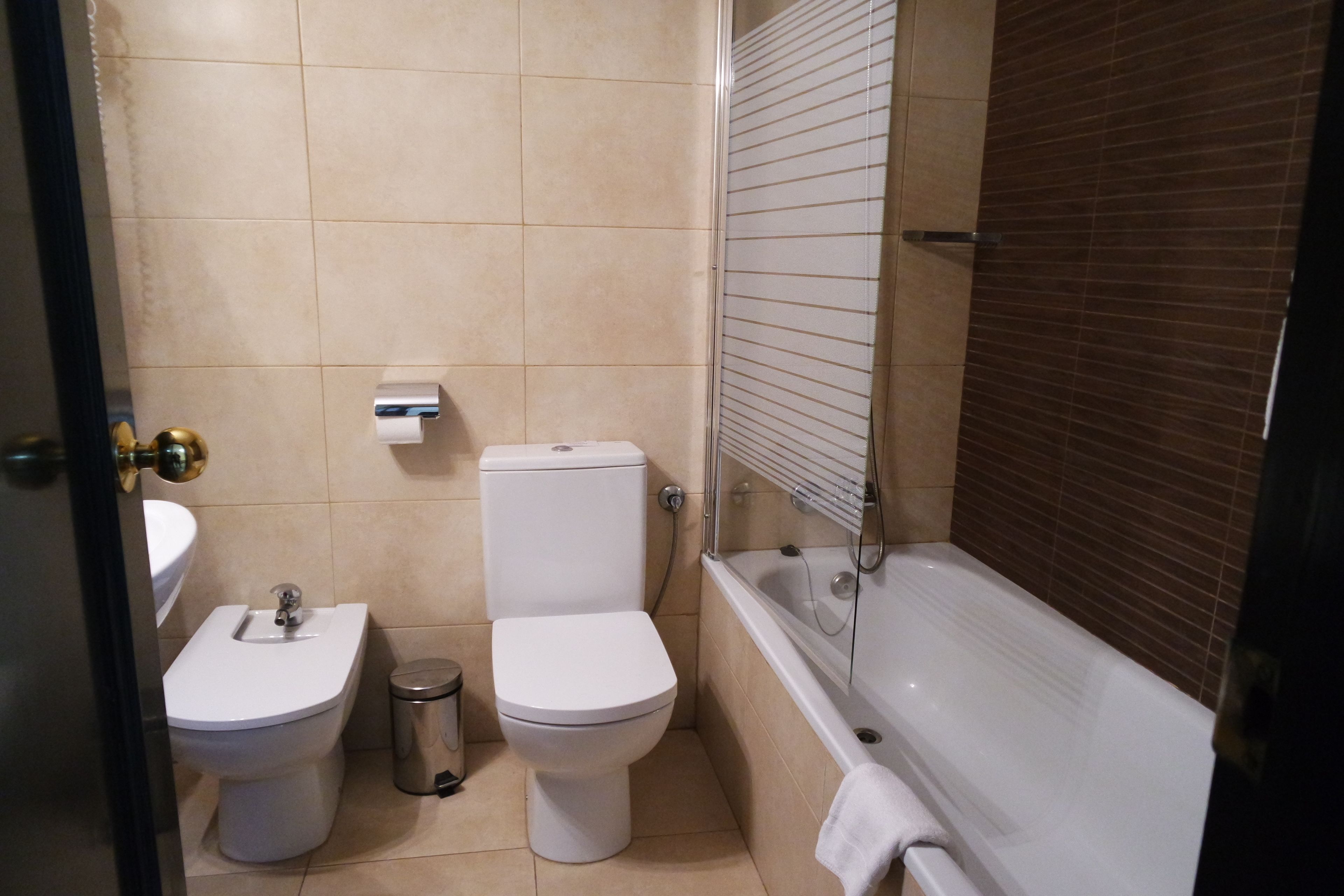 basic twin room, private bathroom | 1 bedroom, down duvets, desk, blackout curtains