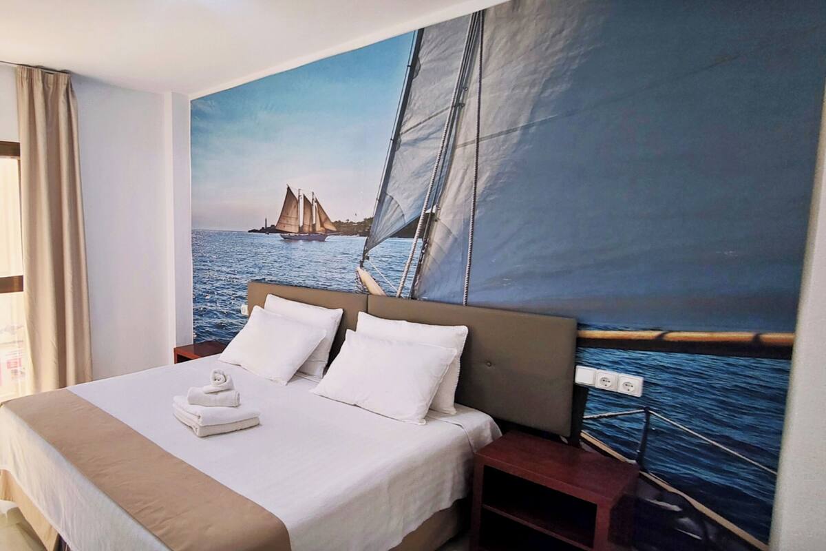 Down duvets, desk, blackout curtains, soundproofing