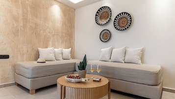 Superior Apartment, Sea View | Minibar, individually decorated, soundproofing, iron/ironing board