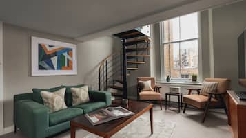 Double-Double Room | Living area | 43-inch flat-screen TV with digital channels, LED TV