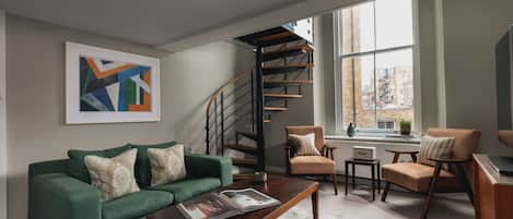 Double-Double Room | Living area | 43-inch flat-screen TV with digital channels, LED TV