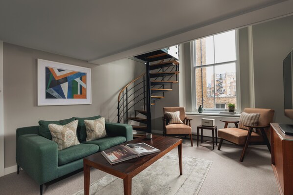 Double-Double Room | Living area | 43-inch flat-screen TV with digital channels, LED TV