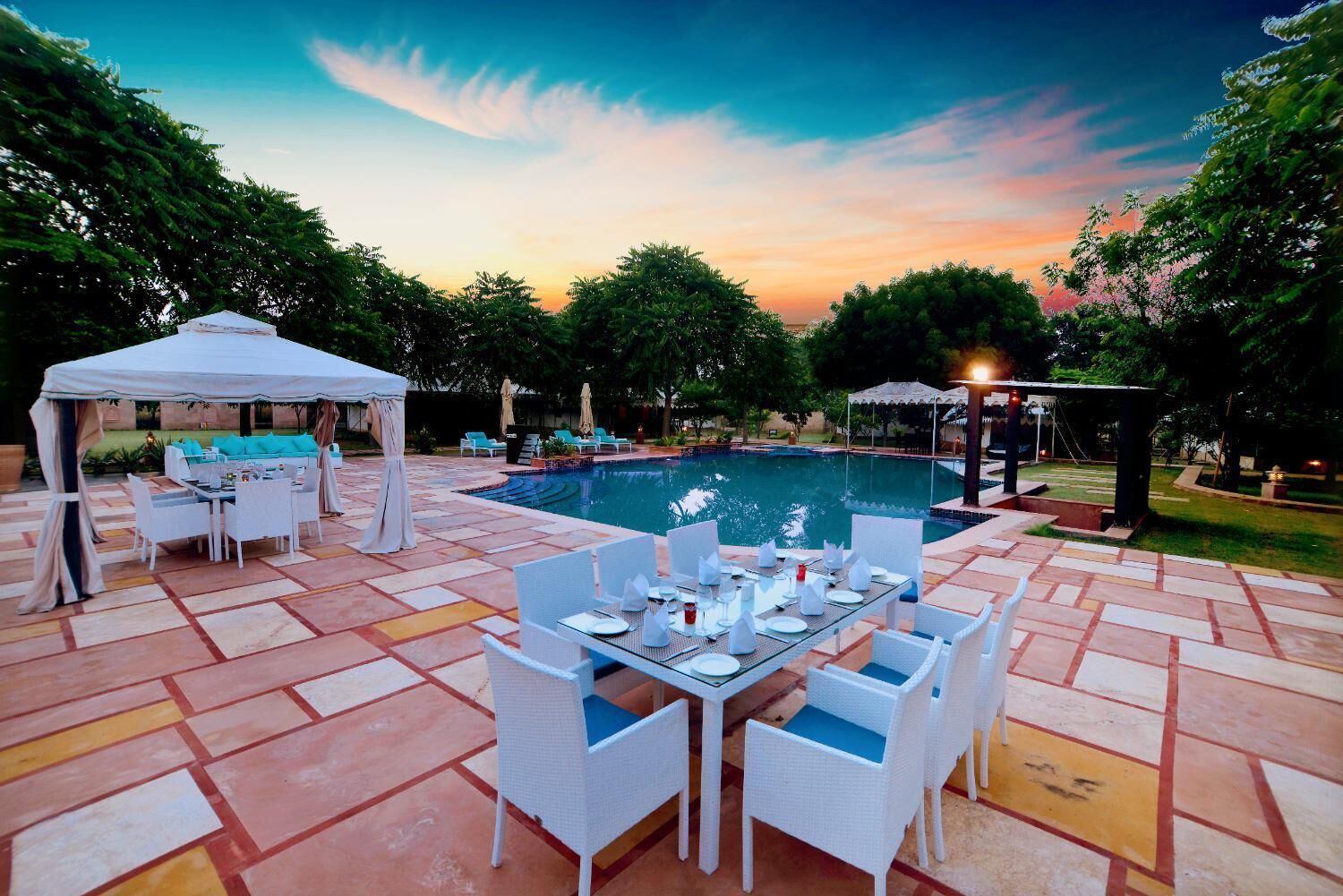 outdoor pool, pool umbrellas, pool loungers