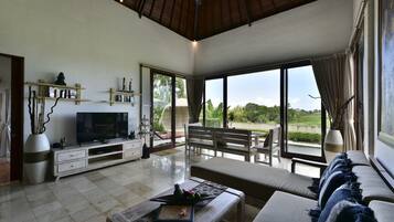 Villa, 2 Bedrooms (Sahaja 4) | Living area | 43-inch LED TV with cable channels, DVD player, toys