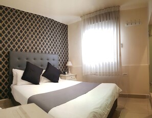 Double or Twin Room | Down duvets, minibar, in-room safe, individually decorated - Central Hotel (Tel Aviv)