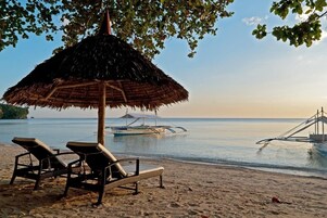On the beach, free beach cabanas, sun loungers, beach umbrellas
