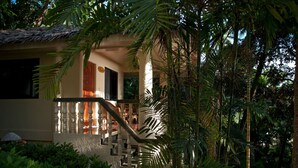 A house with a staircase surrounded by lush greenery. - Easy Diving and Beach Resort (Sipalay)