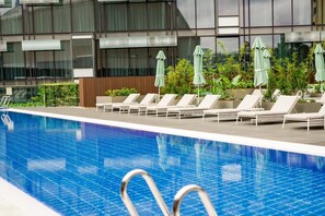 Outdoor pool, pool umbrellas, pool loungers