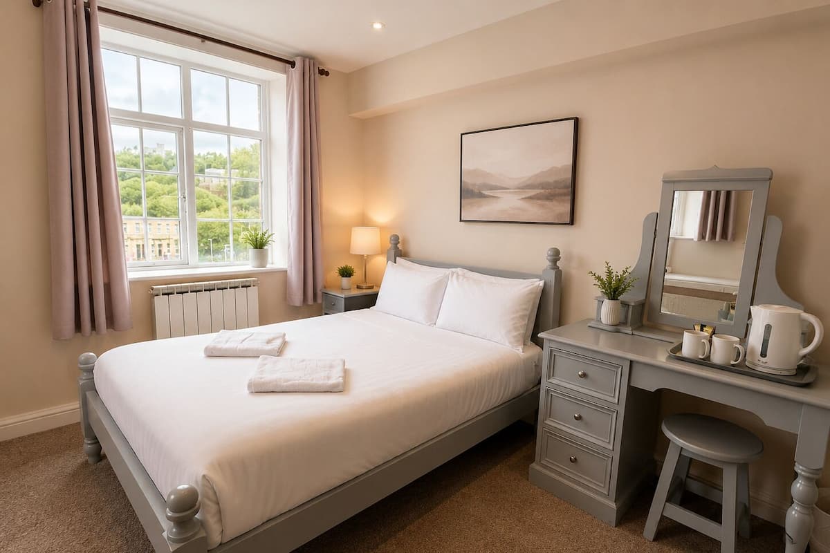 Single Room | Desk, blackout drapes, iron/ironing board, bed sheets