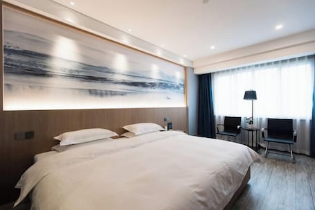 Minibar, in-room safe, iron/ironing board, Internet. Cixi Hotel