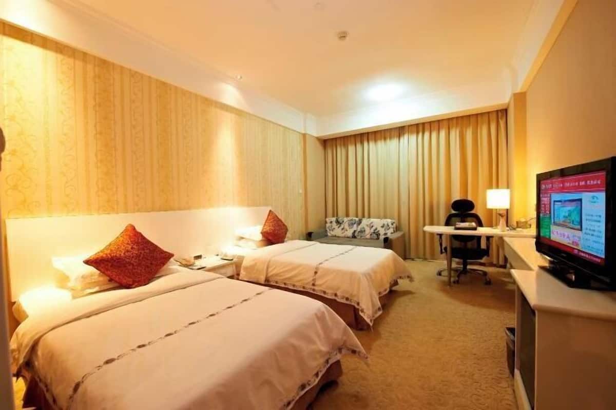 Minibar, coffres-forts dans les chambres, fer et planche à repasser