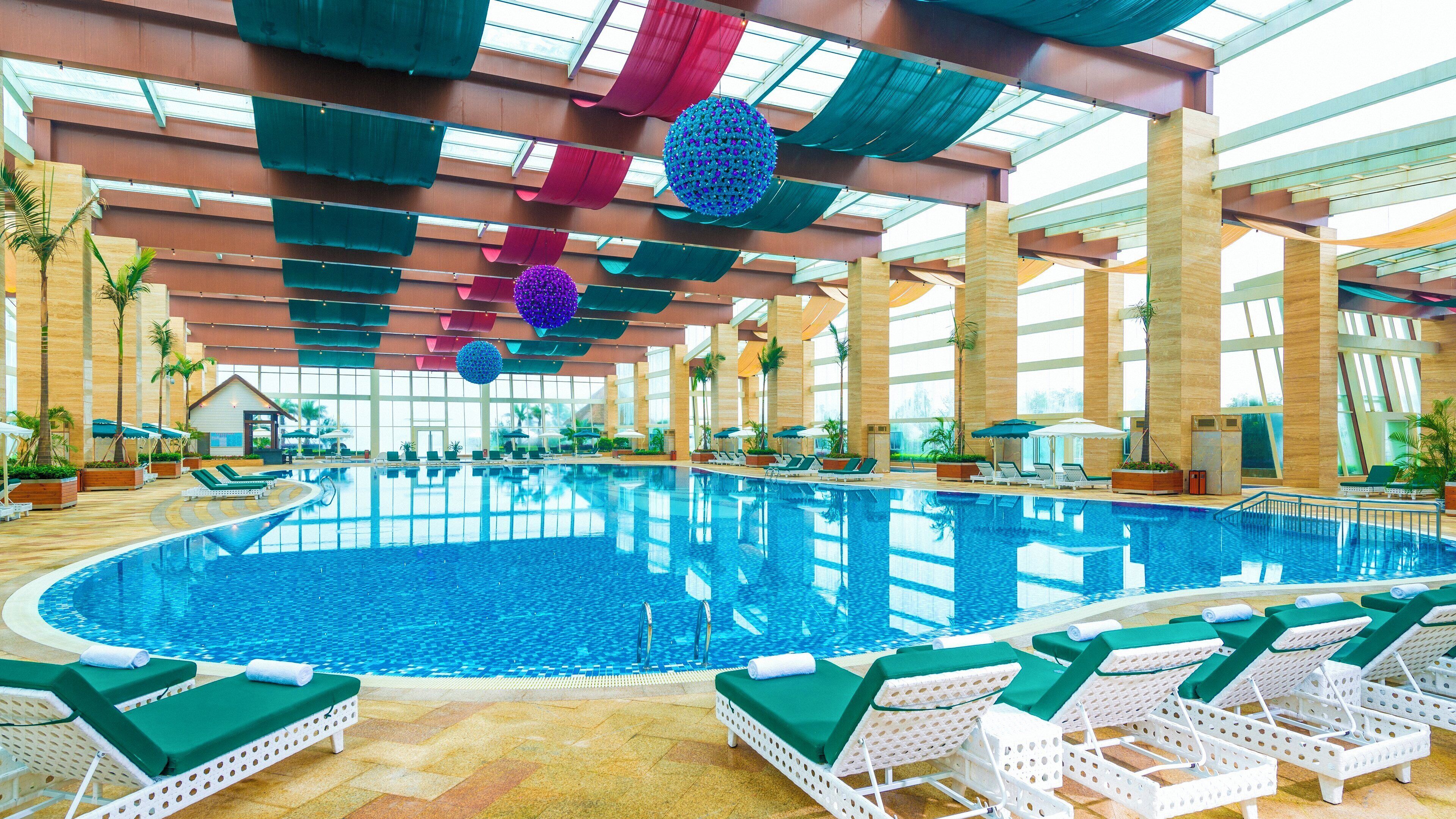 Indoor pool, seasonal outdoor pool, pool umbrellas, sun loungers