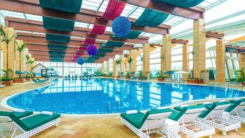 Indoor pool, seasonal outdoor pool, pool umbrellas, sun loungers