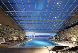 Indoor pool, open 4:30 PM to 8:30 PM, pool loungers