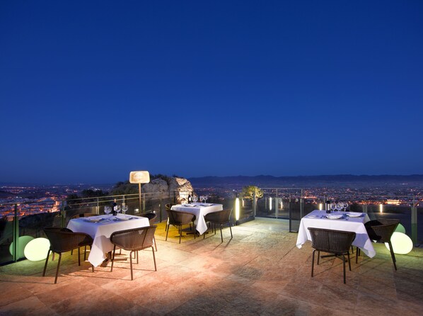 Breakfast, lunch served; international cuisine, al fresco dining