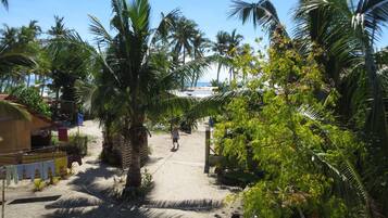 Beach Apartment (Upper Level) | Individually decorated, individually furnished, rollaway beds