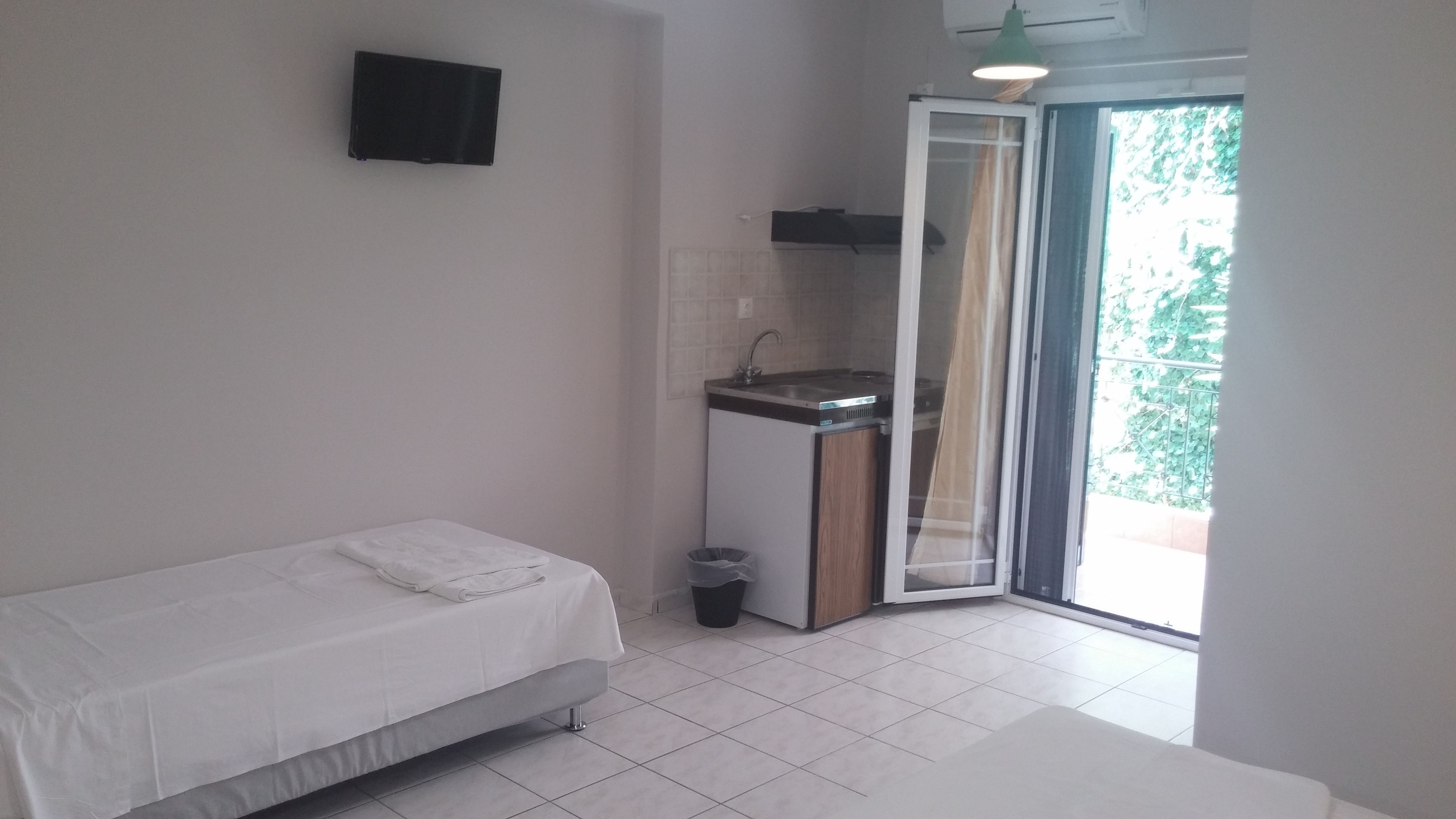 Studio, Garden View | Private kitchen | Fridge