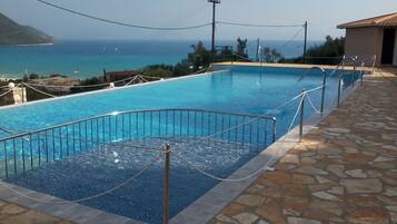 Outdoor pool, sun loungers