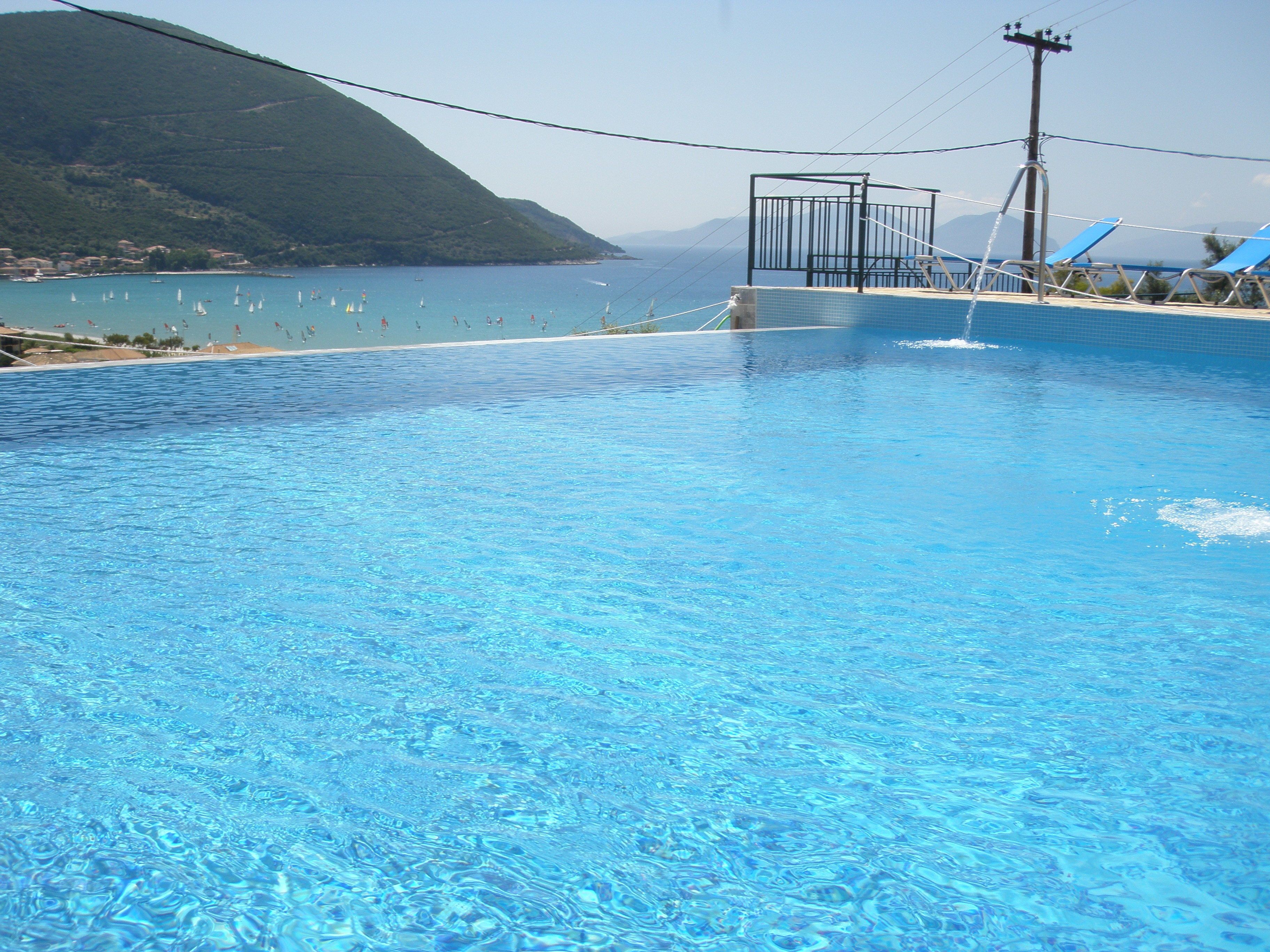 outdoor pool, pool loungers