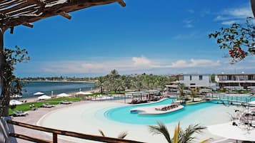 On the beach, sun-loungers, beach umbrellas, beach towels