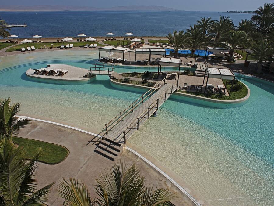 2 outdoor pools, open 9 AM to 9 PM, pool umbrellas, sun loungers