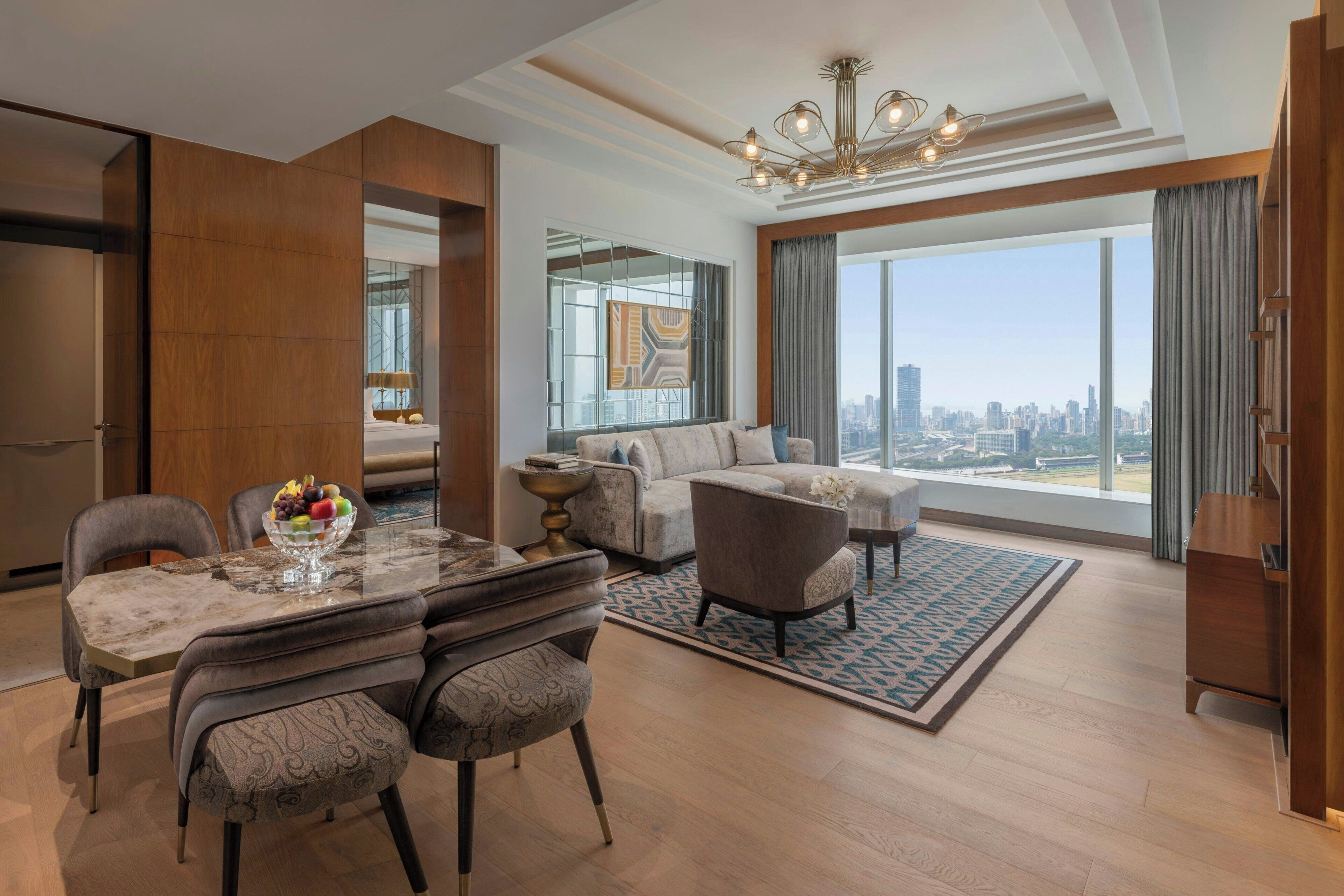 Suite, 1 King Bed | Living room | 42-inch LED TV with satellite channels, TV, DVD player