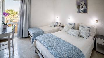 Chambre Triple Standard | Minibar, bureau, fer et planche Ă  repasser, Wi-Fi gratuit