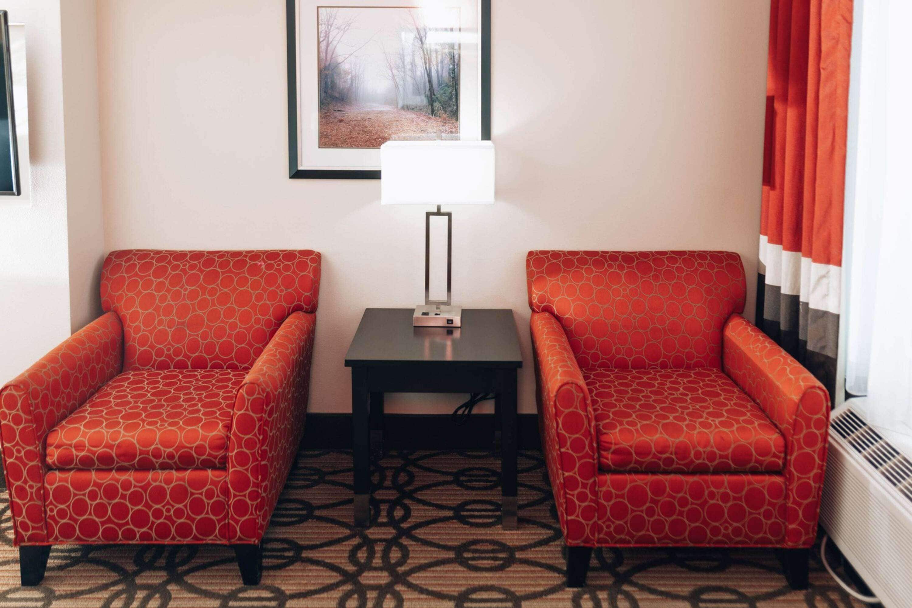 premium bedding, pillow-top beds, desk, laptop workspace