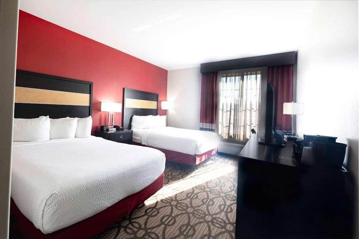 Premium bedding, pillowtop beds, desk, laptop workspace