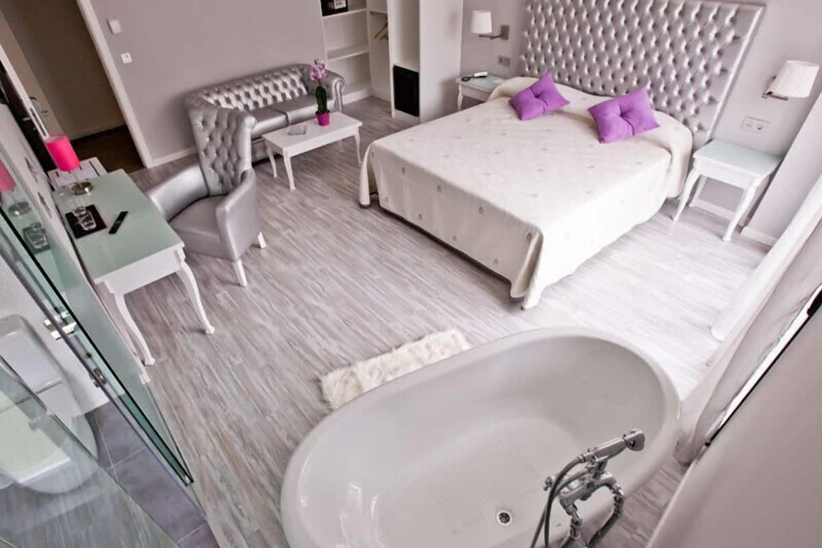 Suite | Premium bedding, down duvets, memory-foam beds, minibar