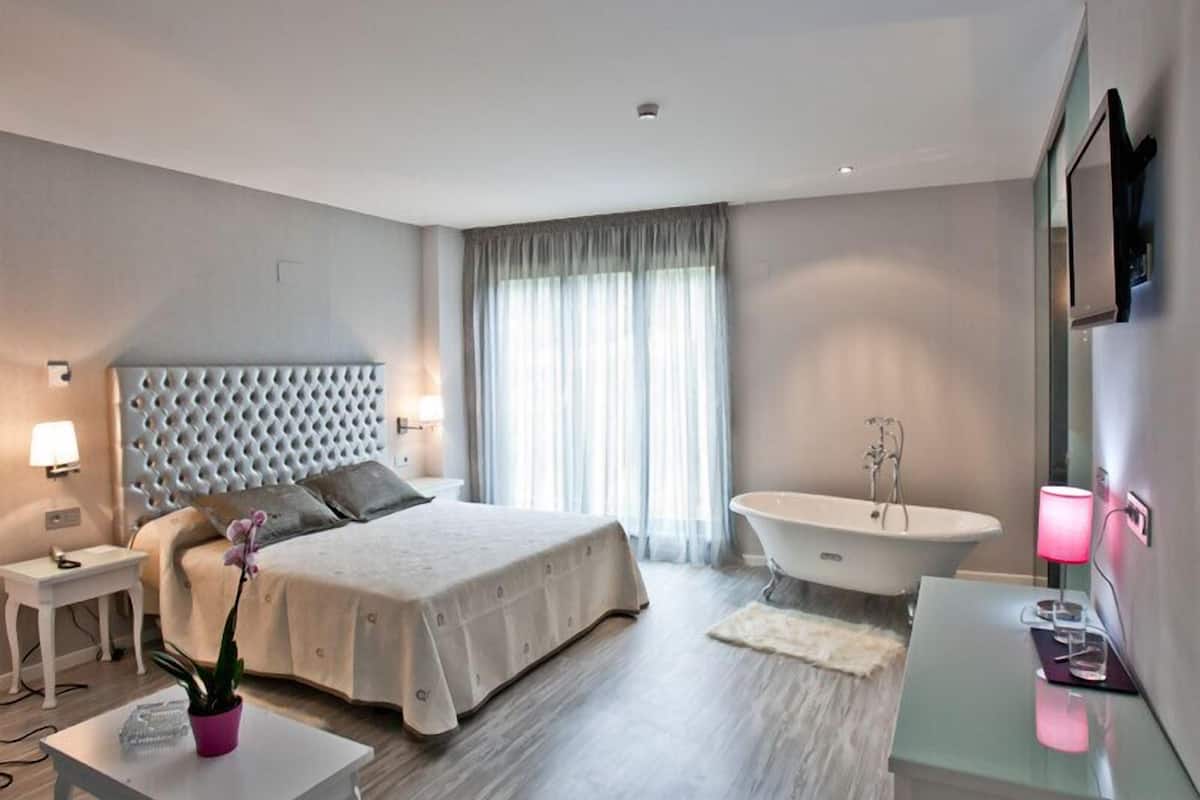 Premium bedding, down duvets, memory-foam beds, minibar