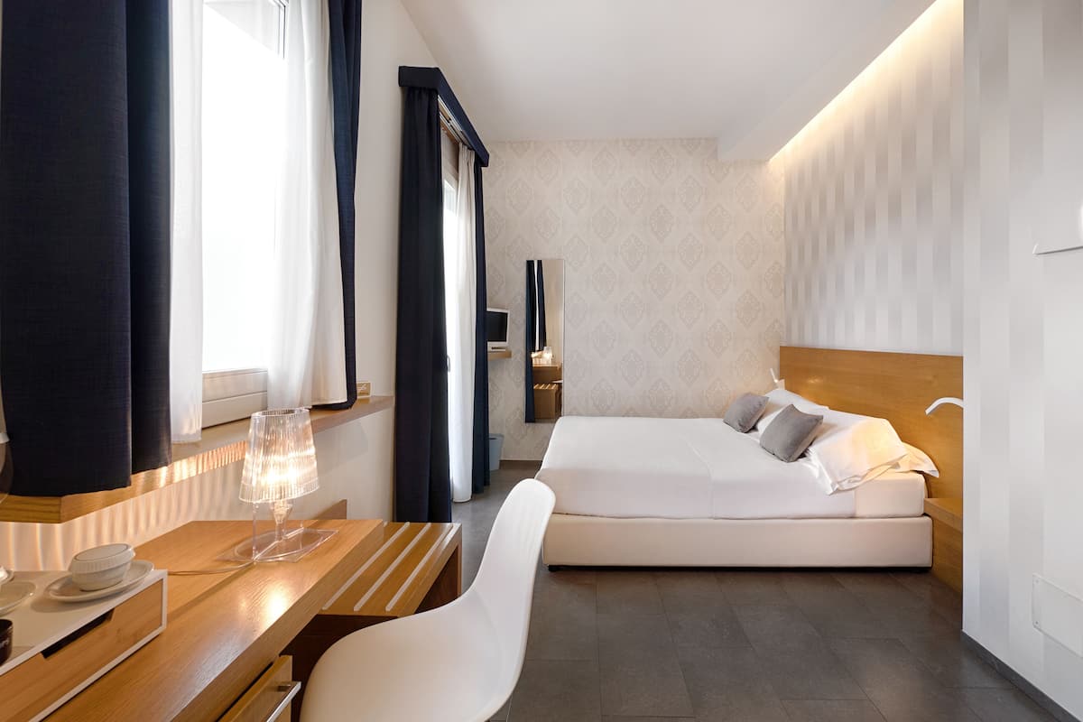 Premium bedding, down duvets, Select Comfort beds, minibar