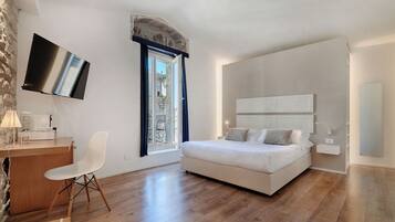 Junior suite | Luxe beddengoed, donsdekens, Select Comfort-bedden, een minibar