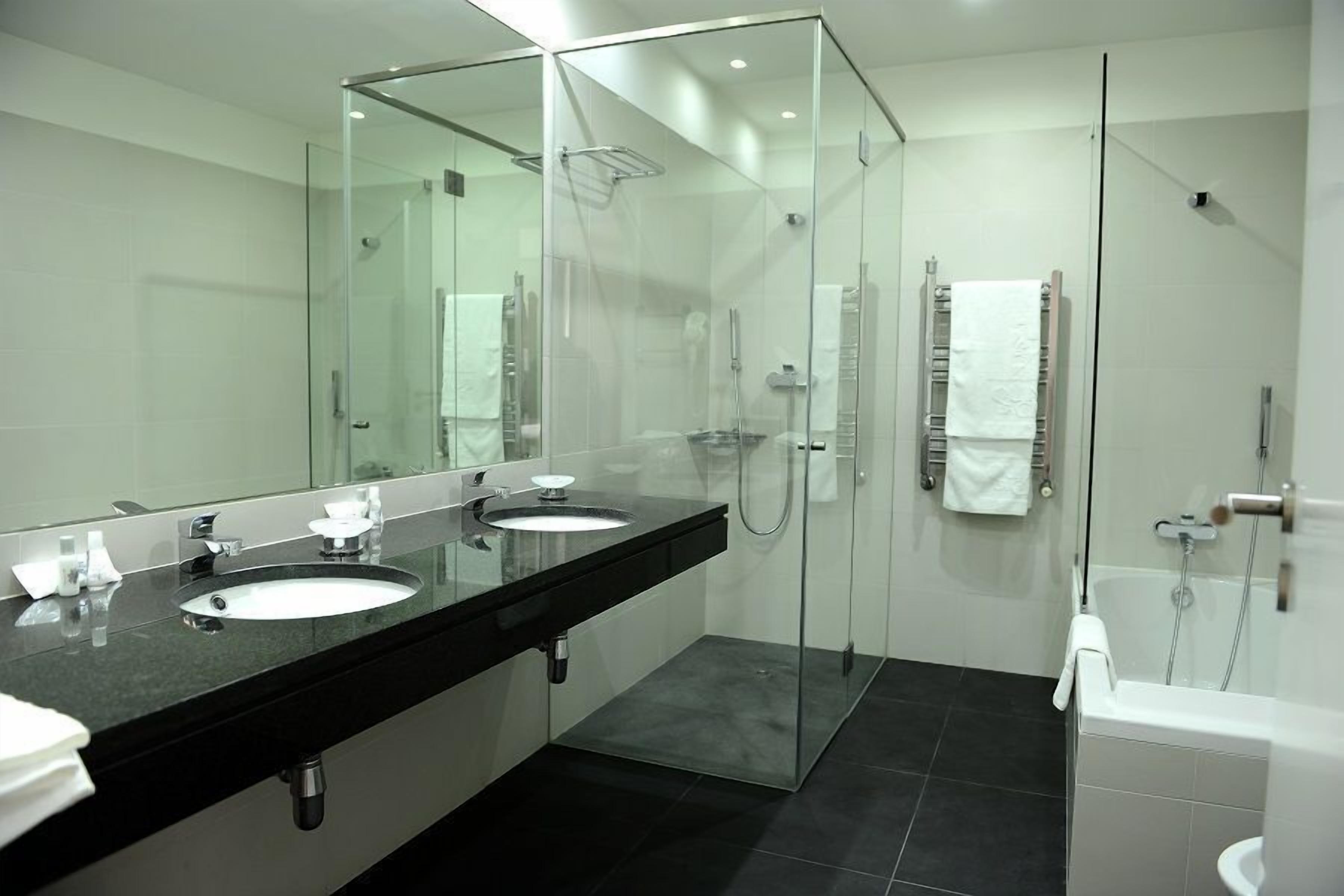 business suite, terrace | bathroom | hair dryer, bathrobes, bidet, towels