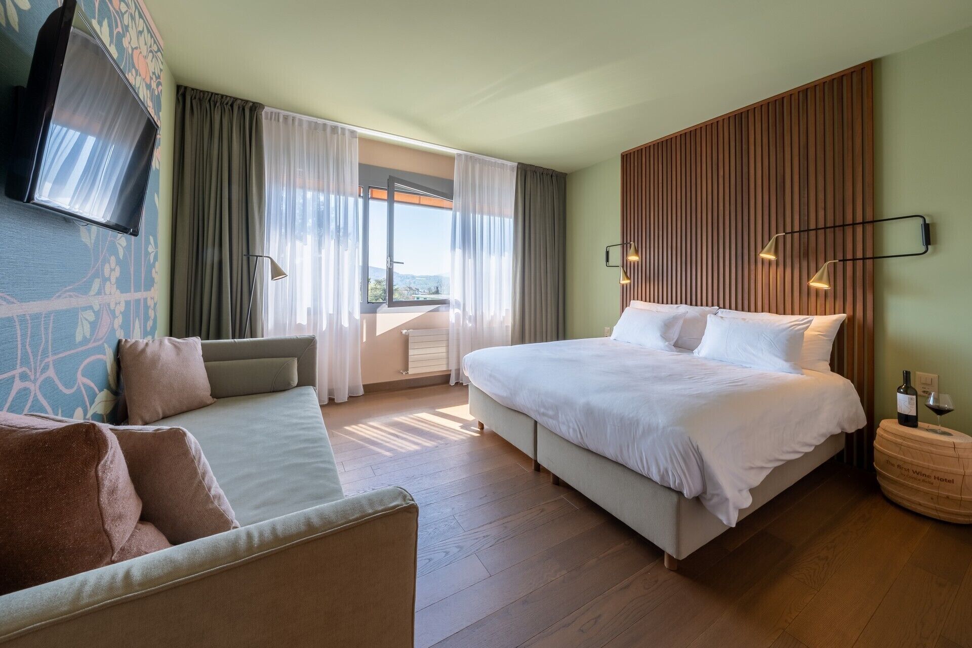 junior suite | minibar, desk, blackout curtains, iron/ironing board