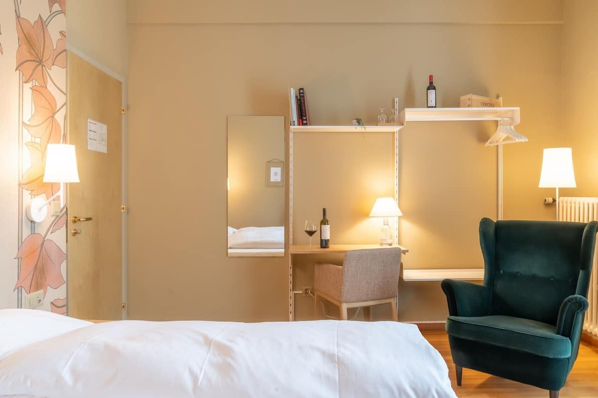 Classic Double Room | Minibar, desk, blackout curtains, iron/ironing board