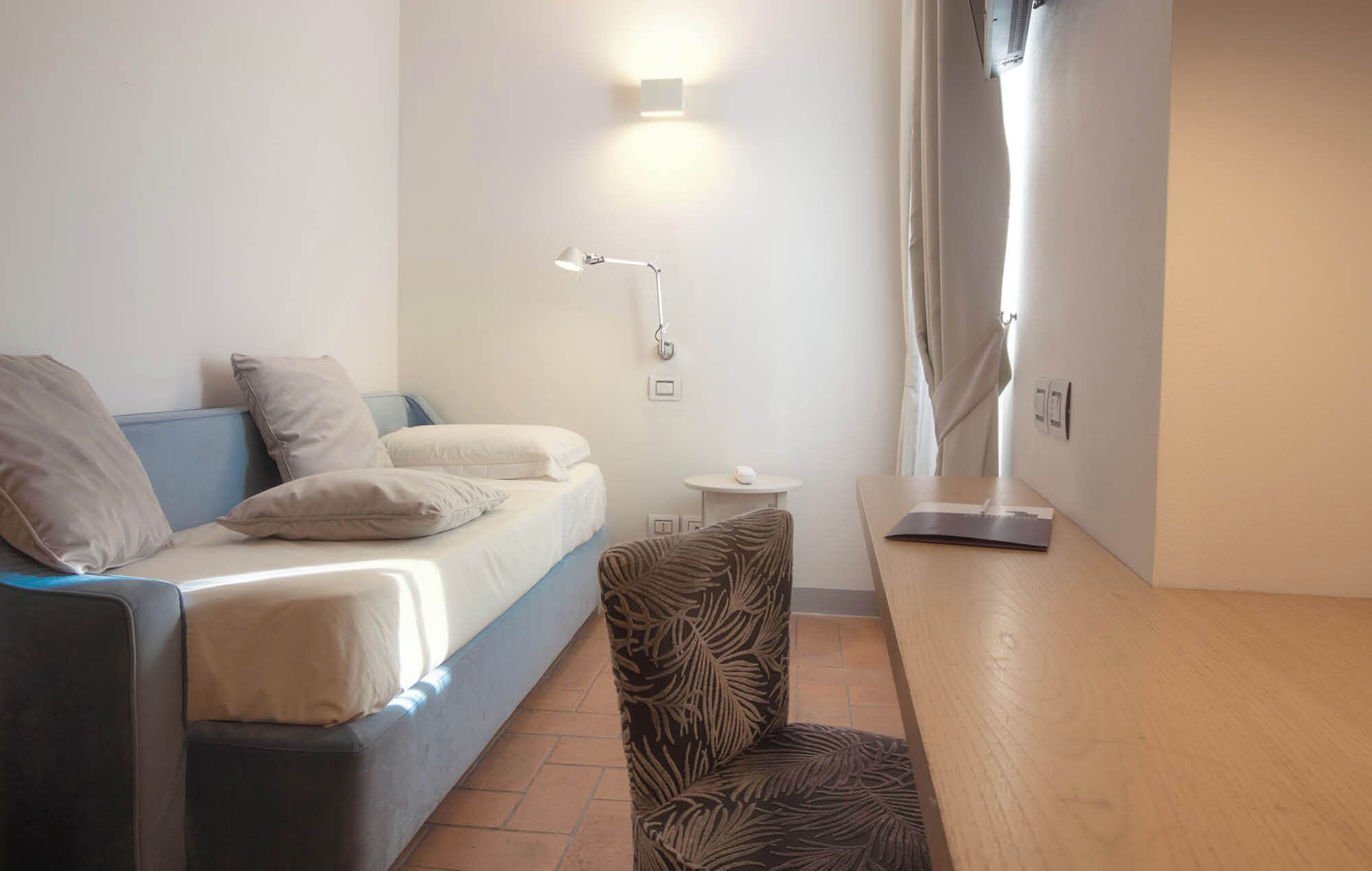 premium bedding, down duvets, memory-foam beds, minibar