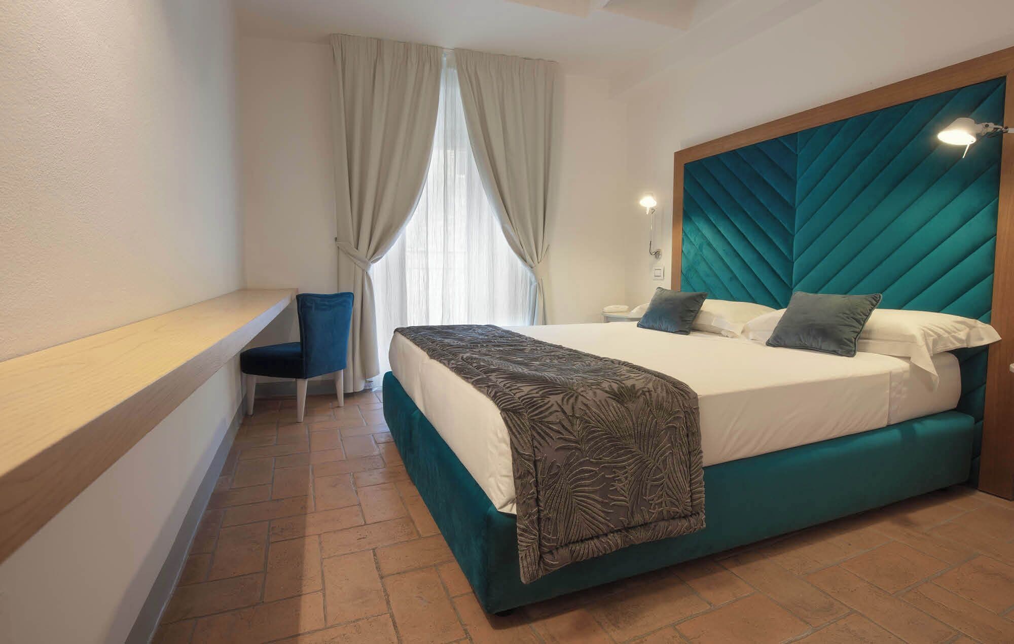 double room | premium bedding, down duvets, memory-foam beds, minibar